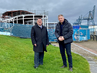 Buzzworks Scotts restaurant announcement new Greenock cruise ship visitor centre. Pictured are Councillor Stephen McCabe, leader of Inverclyde Council, and Kenny Blair, Buzzworks Holdings MD, at the c